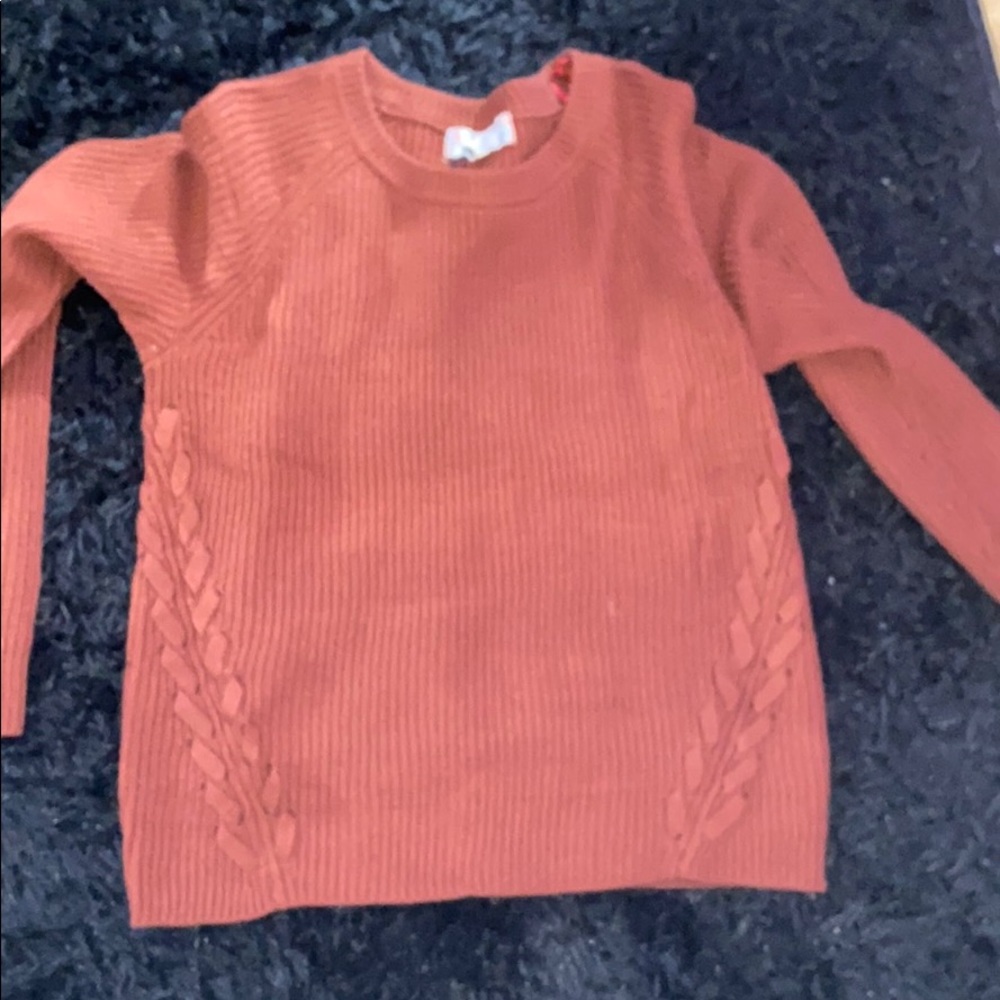 orange sweater